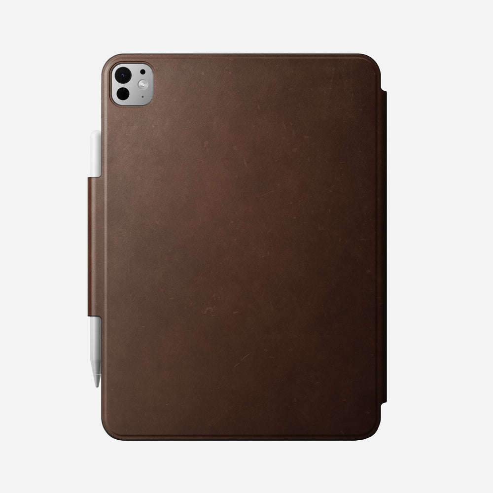 Leather Folio gives your iPad Pro 11" (M4) a sophisticated look while maintaining its slim profile. It effortlessly folds into multiple kickstand positions, enhancing activities like viewing, reading, FaceTiming, and more. Plus, a magnetic flap gives you the flexibility of using your Folio with or without your Apple Pencil. - Image 9