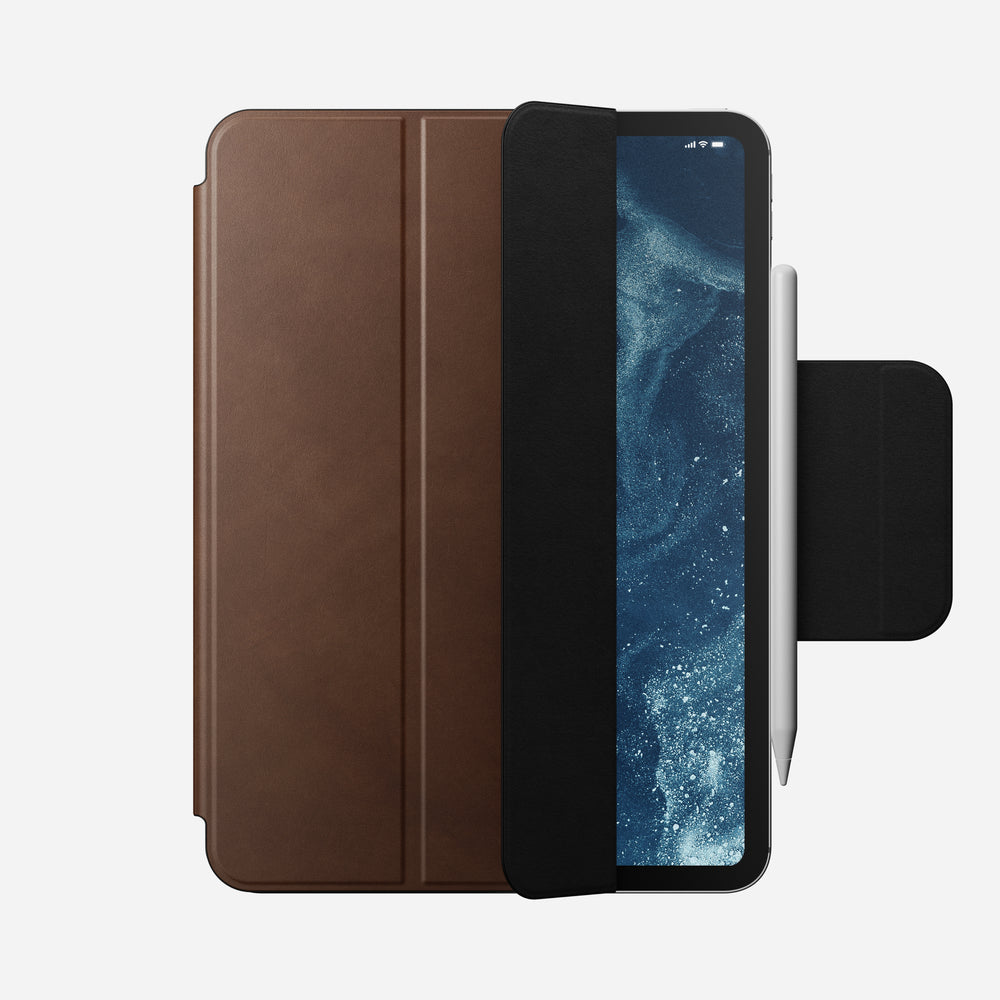 Leather Folio gives your iPad Pro 11" (M4) a sophisticated look while maintaining its slim profile. It effortlessly folds into multiple kickstand positions, enhancing activities like viewing, reading, FaceTiming, and more. Plus, a magnetic flap gives you the flexibility of using your Folio with or without your Apple Pencil. - Image 2